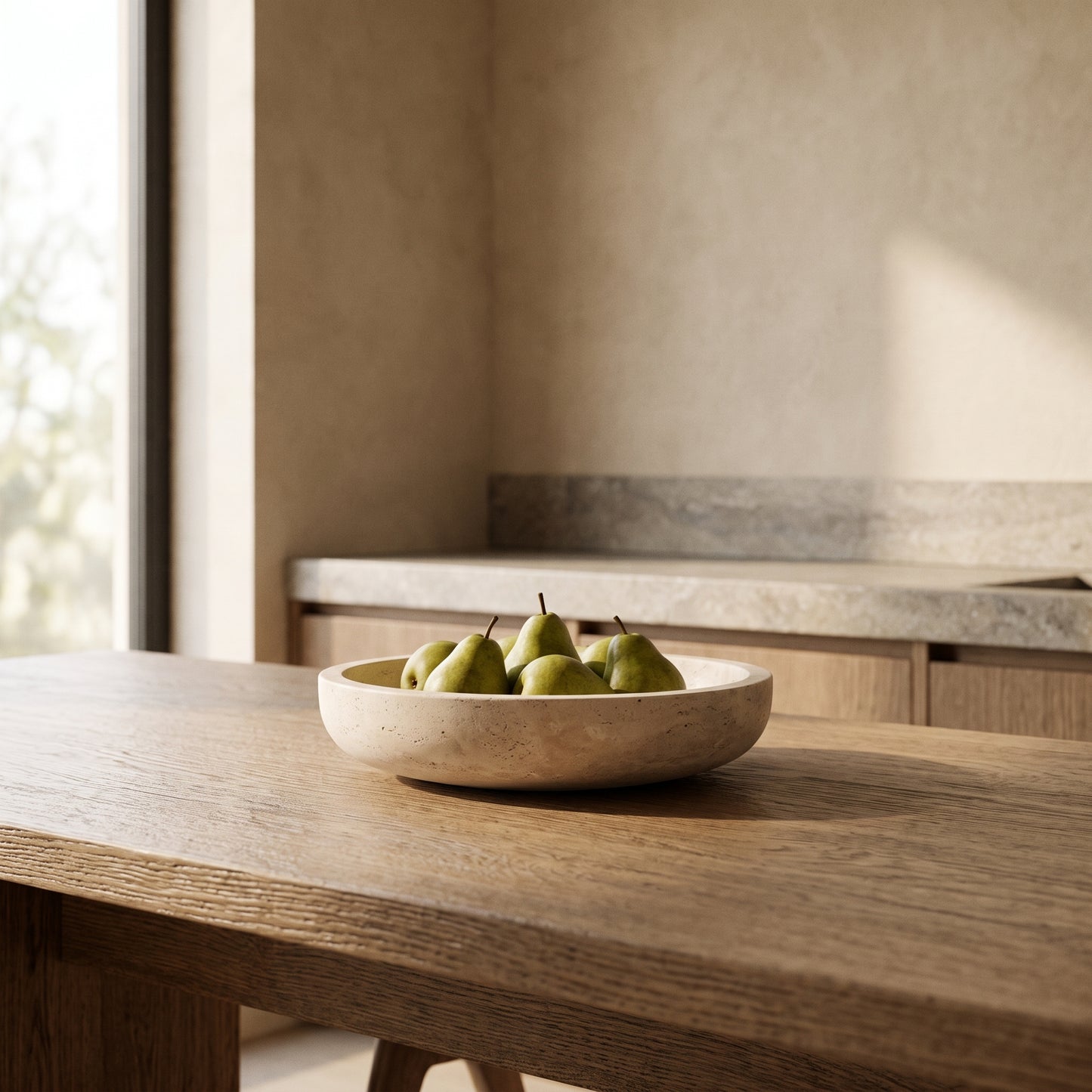 Quarry™ Marble Centerpiece Bowl with pears on a long oak table in Kopflo style