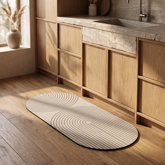 Stone™ Quick-Dry Kitchen Mat in front of the oak cabinetry in a warm Kopflo-style kitchen