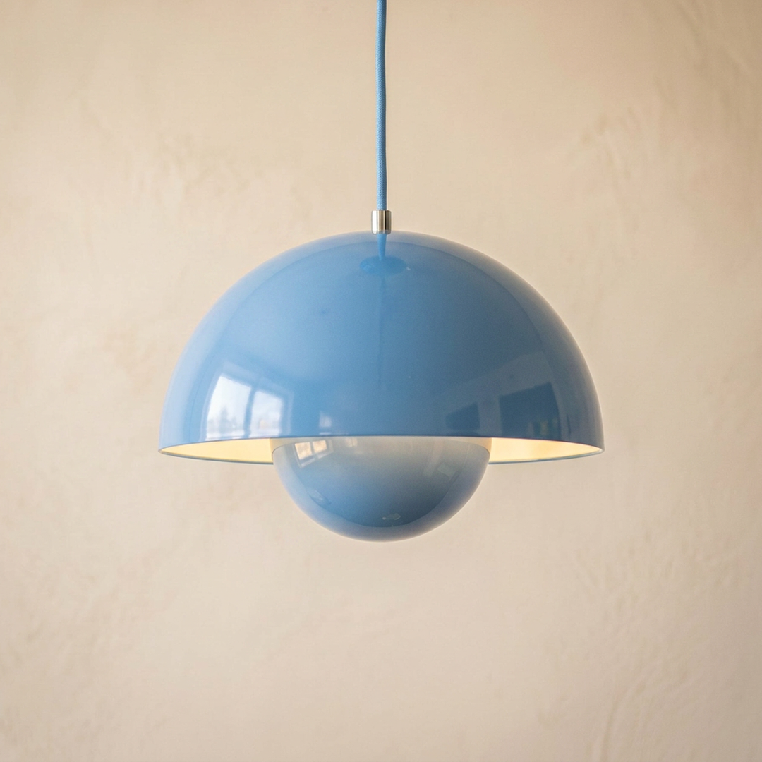 Bud pendant light in Sky, a clear soft blue lacquer shade