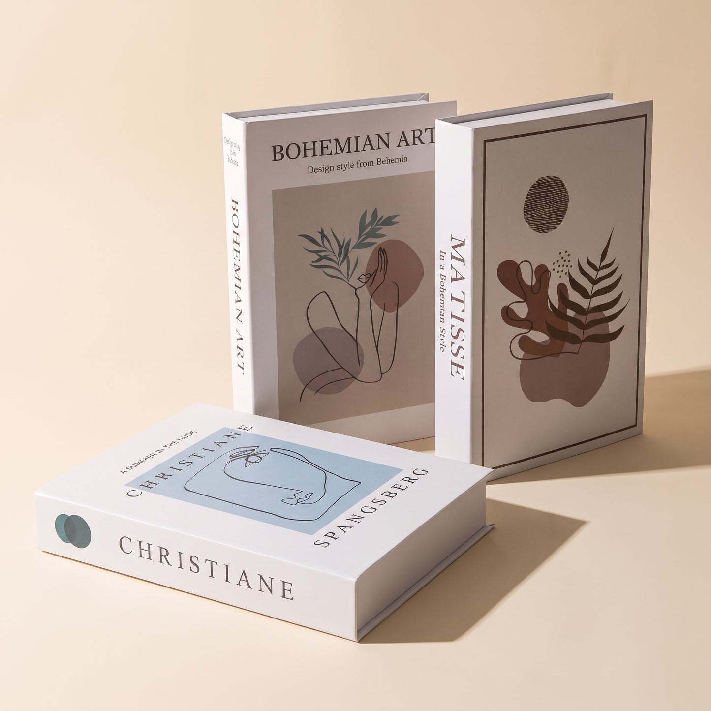 Folio™ Book Storage Box — Bohemian set of three faux-book boxes on warm cream background