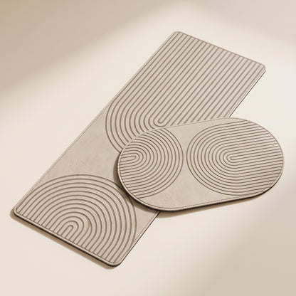 Stone™ Quick-Dry Kitchen Mat — greige runner and oval mats on warm cream background