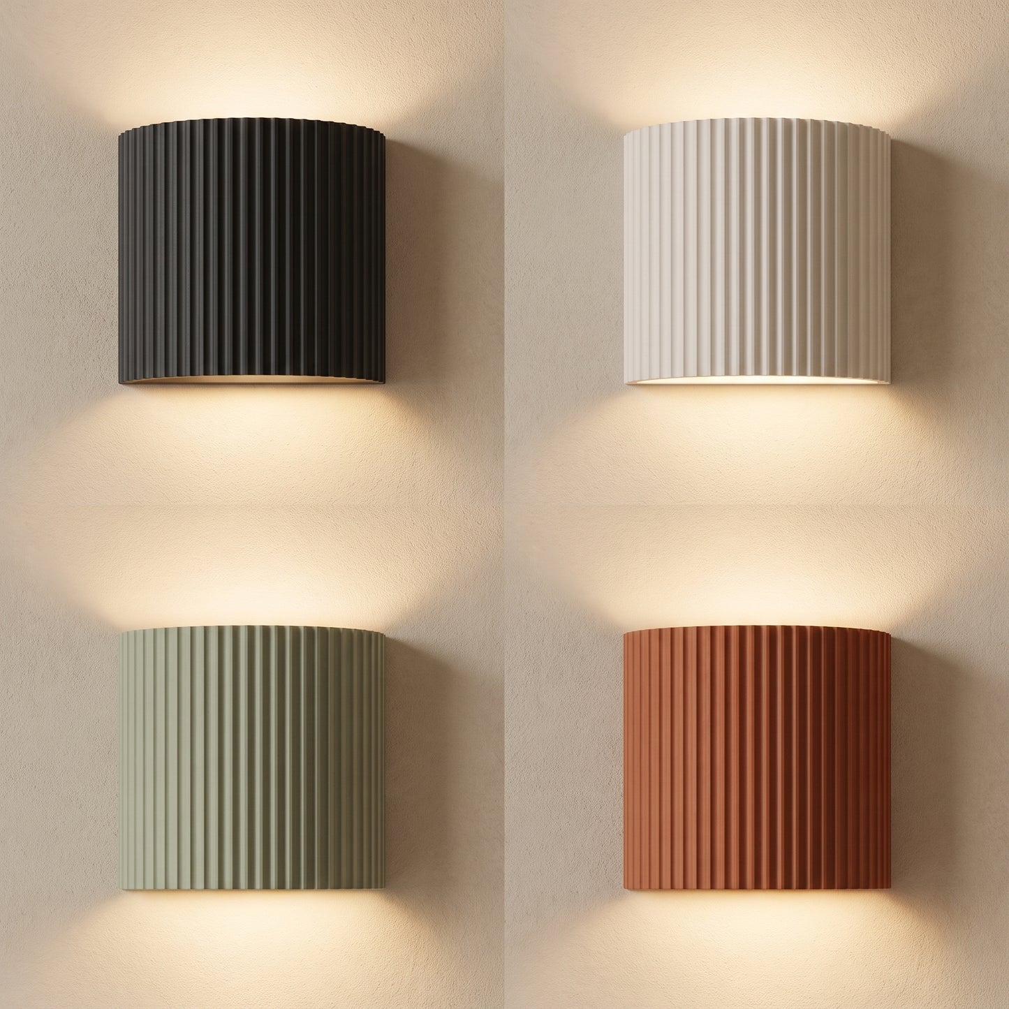 Flute fluted wall sconces in charcoal, white, sage and terracotta lit on warm cream plaster
