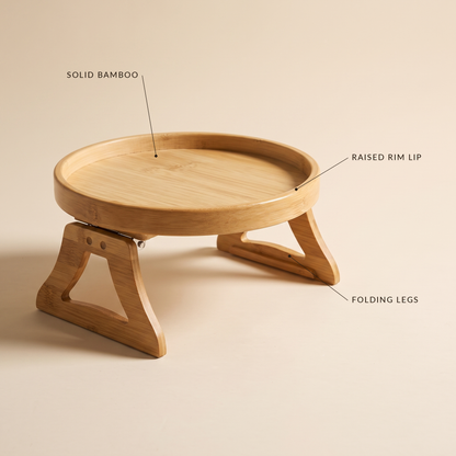 Saddle™ detail — solid bamboo, raised rim lip and folding clamp legs