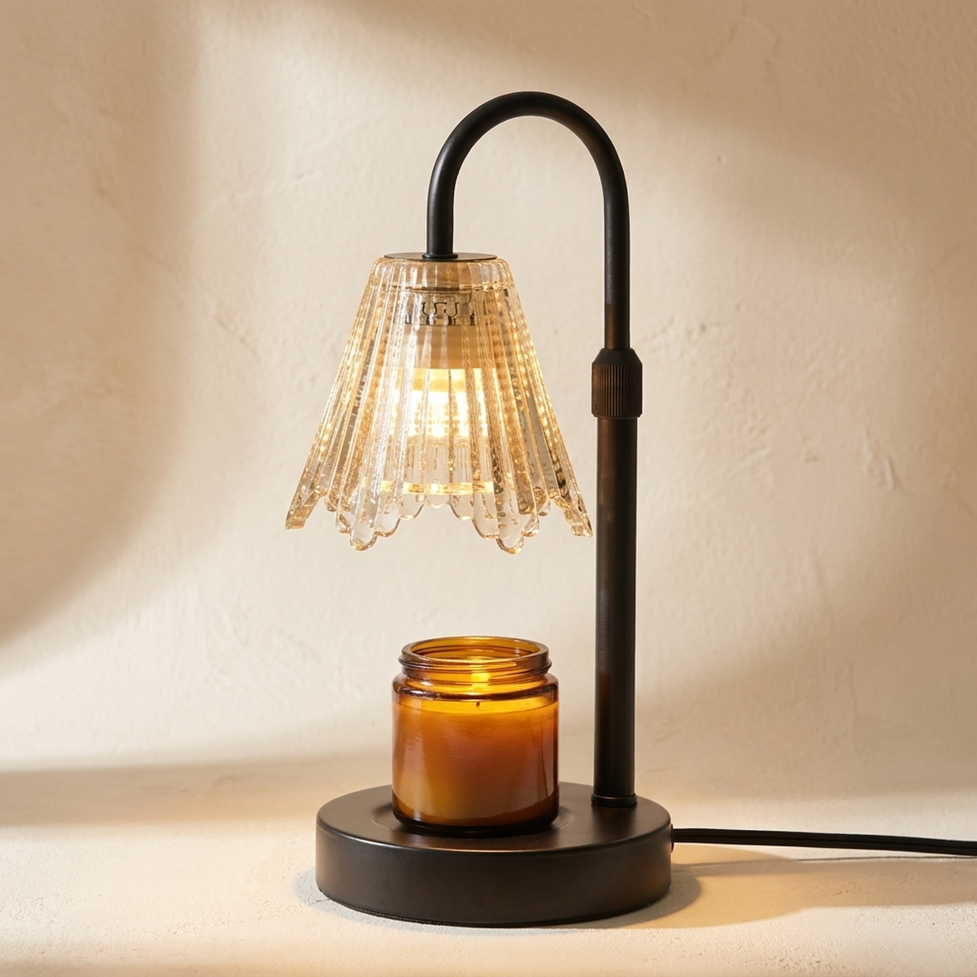 Taper™ Candle Warmer Lamp on a warm cream plaster background
