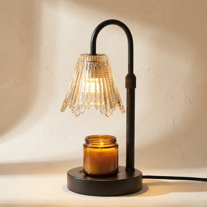 Taper™ Candle Warmer Lamp on a warm cream plaster background