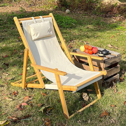 Siesta Bamboo Recliner on grass with picnic table